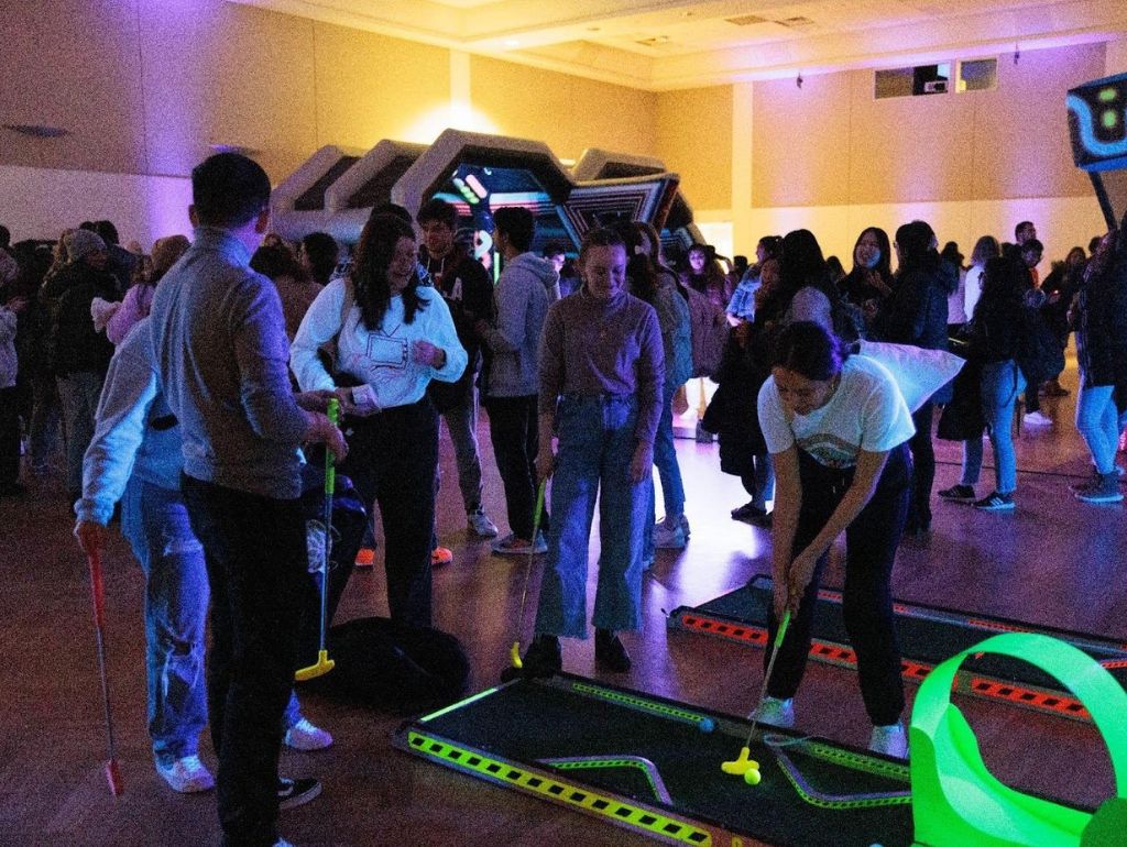 students play games at midnight breakfast