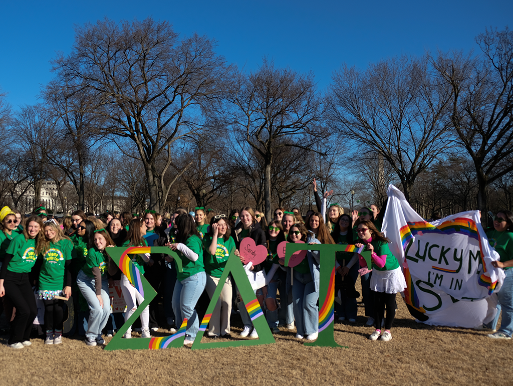 Sorority poses for group photo in matching shirts
