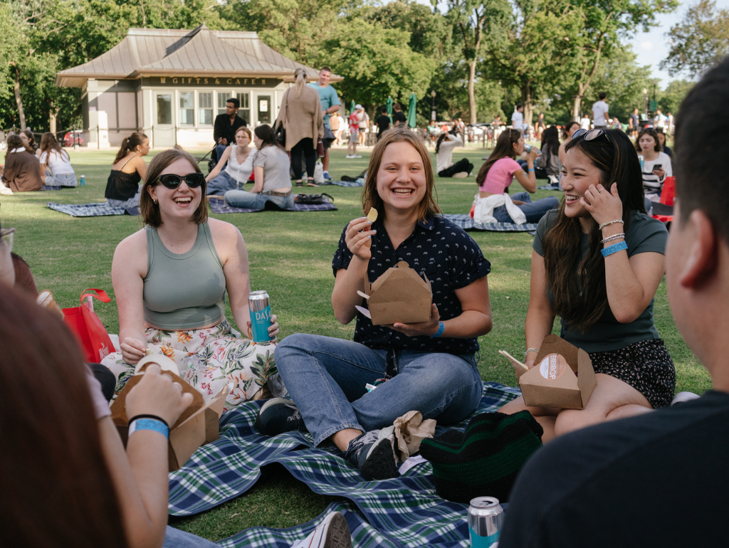 Students having a picnic on the National Mall at the NSO Kickback event