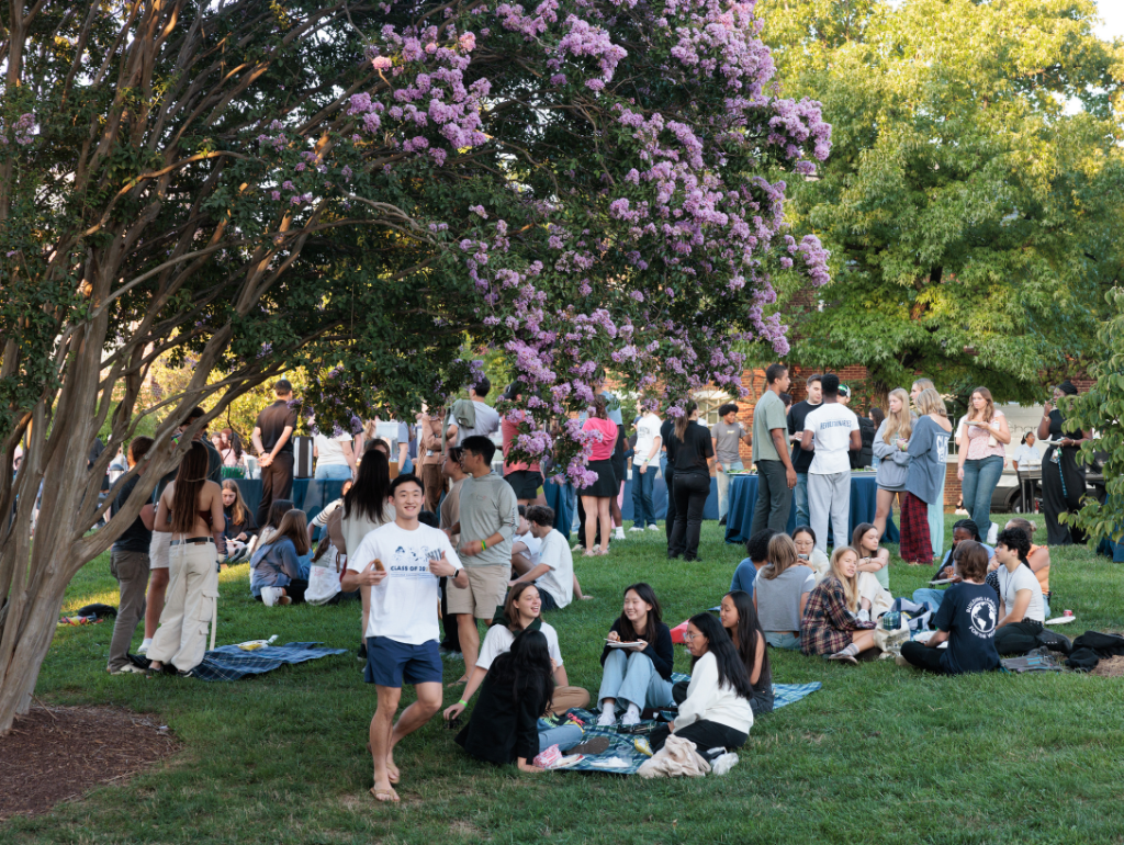 A large crowd of students hanging out and lounging on the MVC Quad