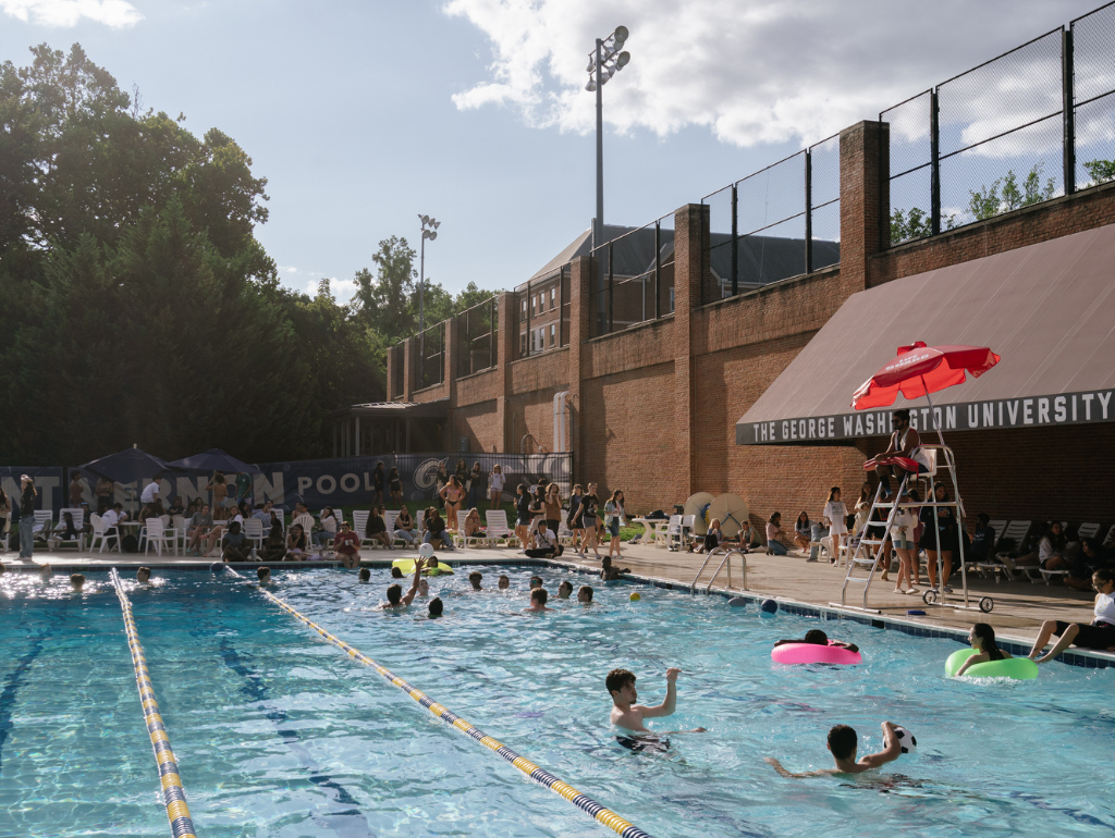 Mount Vernon Campus pool with students swimming and hanging out at an event